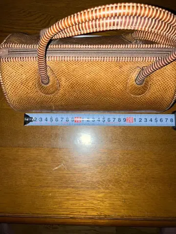 브라운 가죽 핸드백 망사 무늬