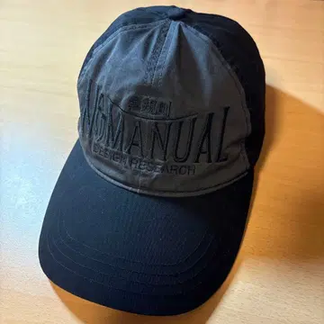 NOMANUAL 2C TRUCKER BALL CAP BLACK
