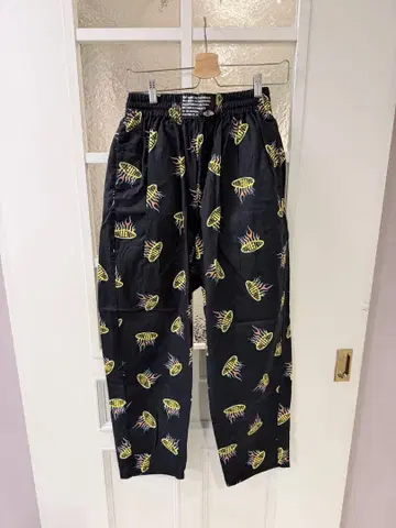 CHALLENGER 파이어 패턴 이지 팬츠 프레임스