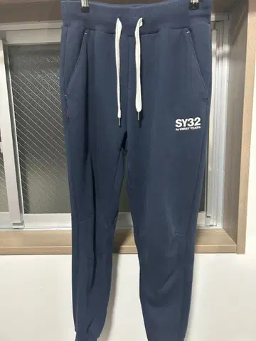 SY32 네이비 조거 팬츠