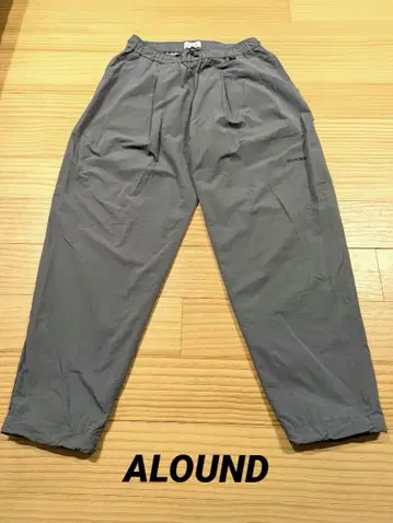ALOUND 어라운드 TWOTUCK TAPERED NYLON PANTS