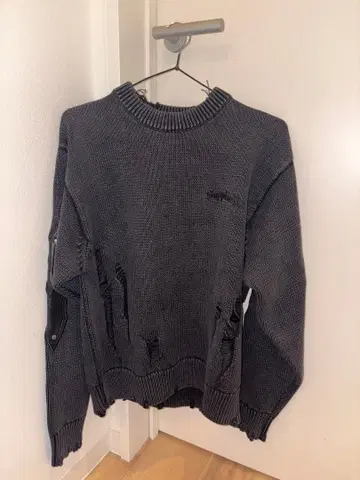 Distressed Cross Leather Patch Crew Knit