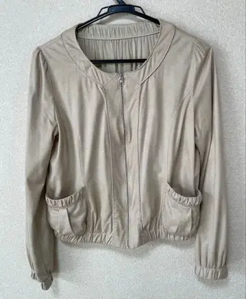 베이지 노카라 자켓 폴리에스테르 100%