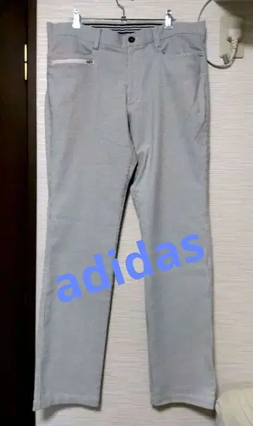 그레이 체크 무늬 지퍼 포켓 부착 팬츠