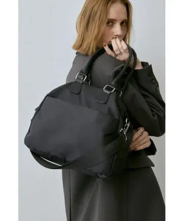 un/neu 앙노이 2WAY 아웃 포켓 나일론 보스턴 백 블랙