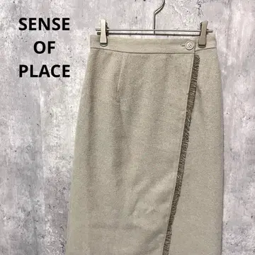 SENSE OF PLACE 프린지 디테일 랩스커트 타이트