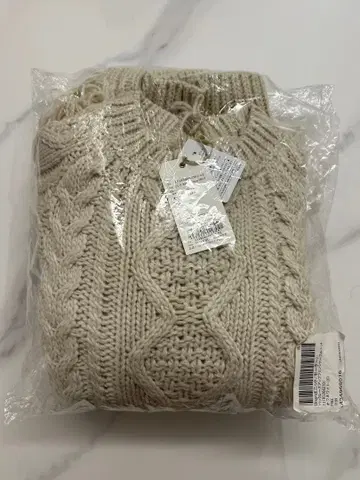 ungrid 백 레이스업 프린지 케이블 니트