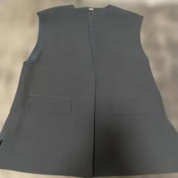 미라 오웬 블랙 노카라 베스트 포켓 부착