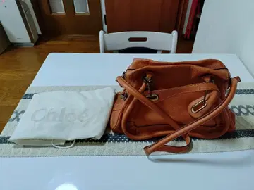 끌로에 파라티 오렌지 가죽 숄더백