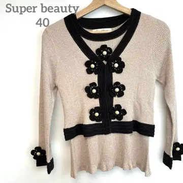 Super beauty 베이지와 블랙의 플라워 모티브 가디건 앙상블