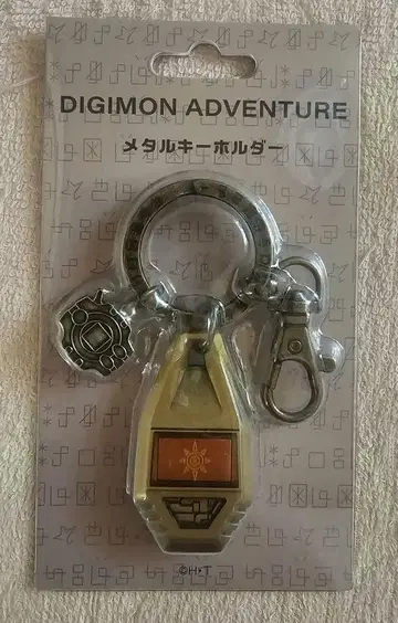 디지몬 어드벤처 메탈 키링 용기의 문장