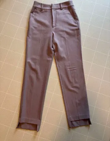 Noble 캐럿 실루엣 헴 스텝 팬츠 34