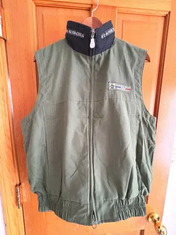 먼싱웨어 다운 페더 베스트 자켓