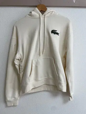 Lacoste 크림색 후드 부착 후드티