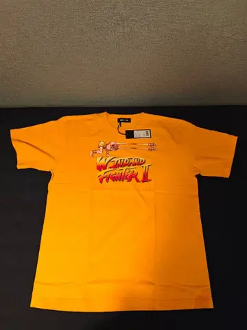 스트리트 파이터 II T셔츠 달심 오렌지 WIND AND SEA