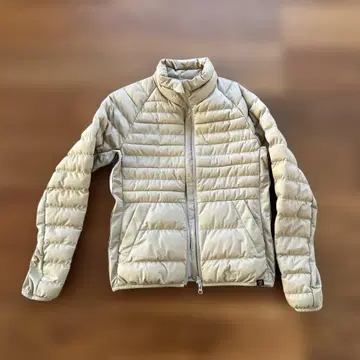 뉴발란스 베이지 다운 자켓