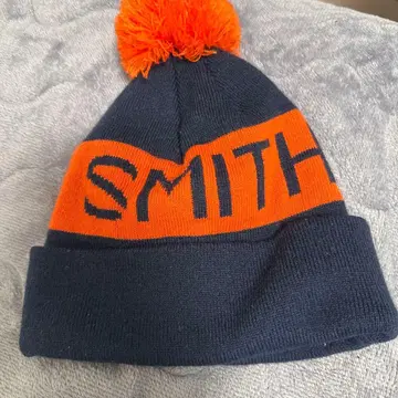 SMITH 폼폼 포함 니트 모자