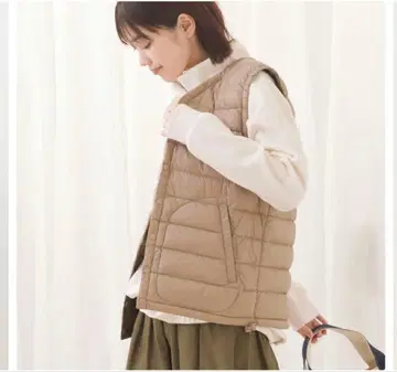 옴네스 새상품급 이너 다운 베스트