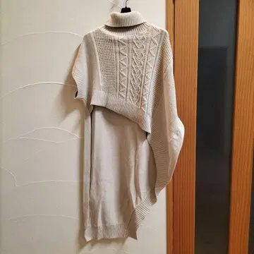 오즈모시스 비대칭 밑단 풀오버