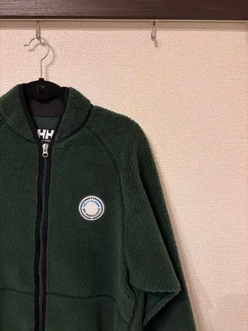 헬리한센 뽀빠이 콜라보 그린 플리스 자켓