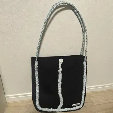 OUTDOOR PRODUCTS 별주 파라코드 파이핑 프릴 토트백