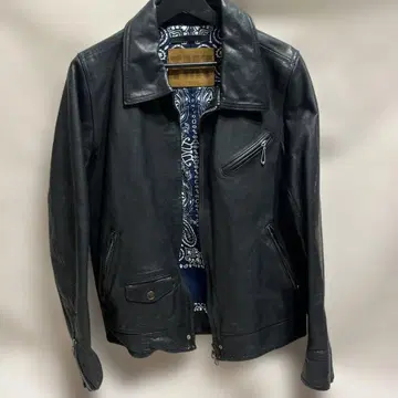 TMT 블랙 가죽 라이더 자켓