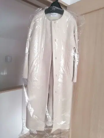 내추럴 뷰티 베이직 노카라 코트 아이보리