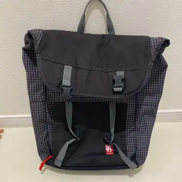 NIXON 블랙 체크 무늬 백팩