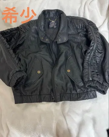 프릴 디자인 블랙 가죽 자켓