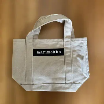 새상품급 2회만 사용. 마리메꼬 로고 토트백 베이지