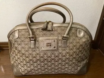 ANYA HINDMARCH 돔형 핸드백 올 패턴 에나멜 골드