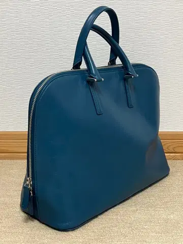 [ 새상품급 ] 비즈니스 가죽 팩토리 부가티 백 터콰이즈 색상