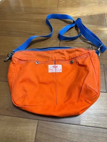 백나운 오렌지 숄더백 지퍼 포함