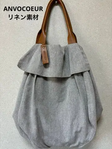 앙쿠르 프릴 장식 그레이 패브릭 토트백