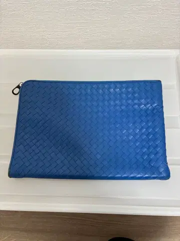 파란색 가죽 뜨개질 클러치백