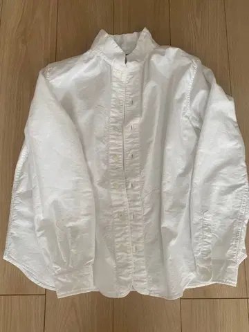 다나 파버 화이트 긴팔 셔츠