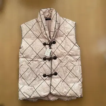 DAKS 핑크 깃털 다운 베스트 판초