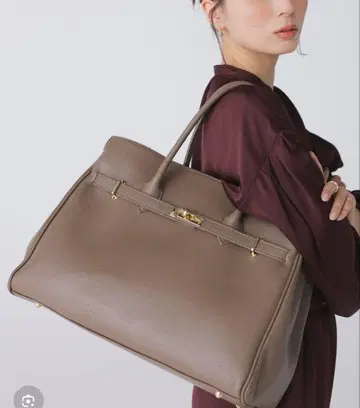 아뉴앙스 [ AULENTTI ] 벨트 디테일 가죽 토트백