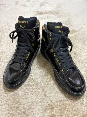 PUMA CAT 블랙 하이컷 스니커즈
