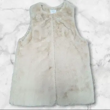 촉감 Discoat 인조 모피 베스트 베이지 디스코트