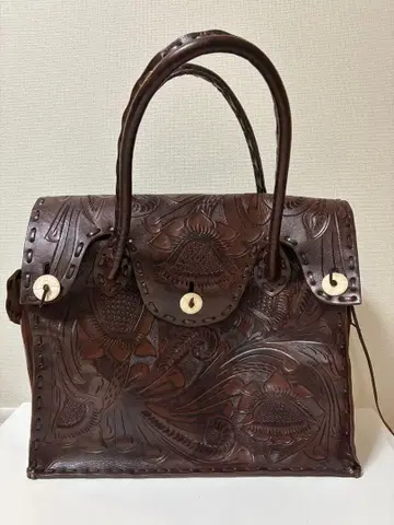 카빙 트라이브스 그레이스 콘티넨탈 토트백 브라운 꽃무늬 소가죽
