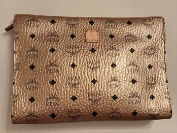 MCM 로즈 골드 클러치백