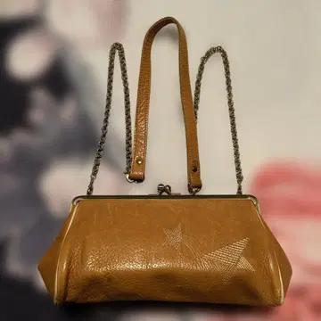 HIRAMEKI. Clasp mini shoulder pochette