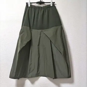 CRESCENT DUO 롱 스커트 이소재 절개 턱