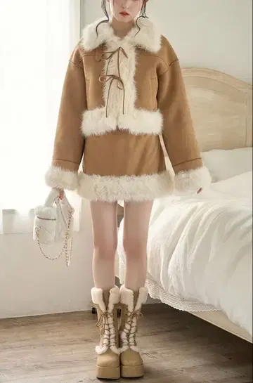 NICE CLAUP 페이크 무스탕 리본 아우터