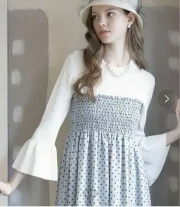 티아라 플레어 슬리브 리브 니트