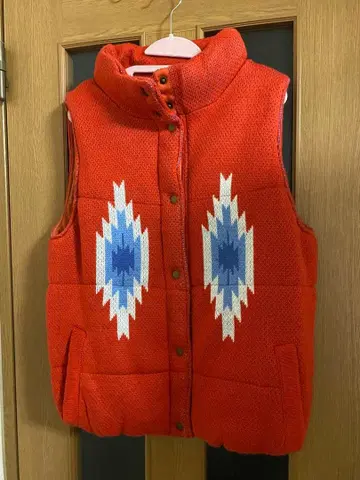 기하학 패턴 오렌지 충전솜 베스트