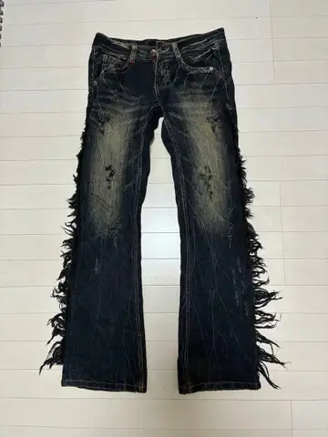 글래드 뉴스 사이드 프린지 부착 플레어 데님 팬츠