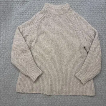 Mila Owen 하이넥 니트 스웨터