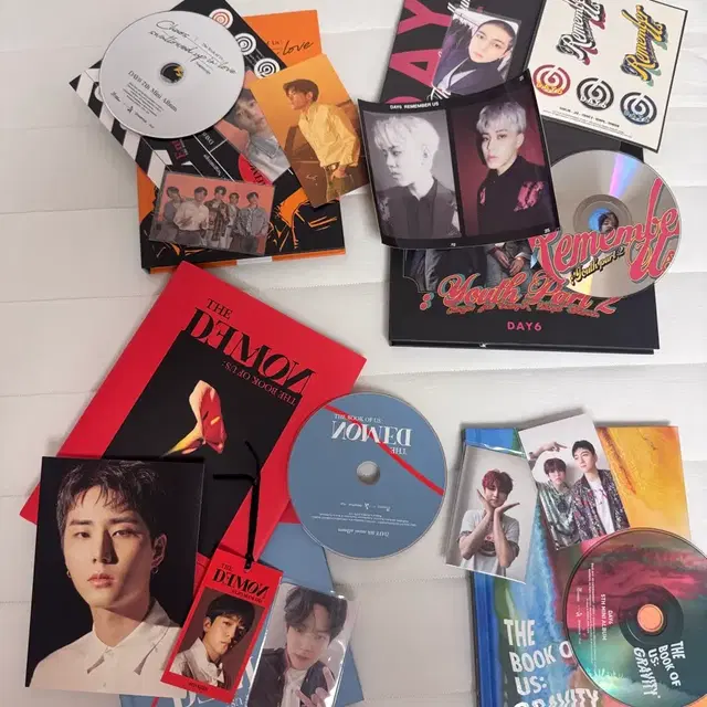 데이식스 네겐트로피, 리멤버어스, 데몬(영케이), 그래비티 앨범 양도